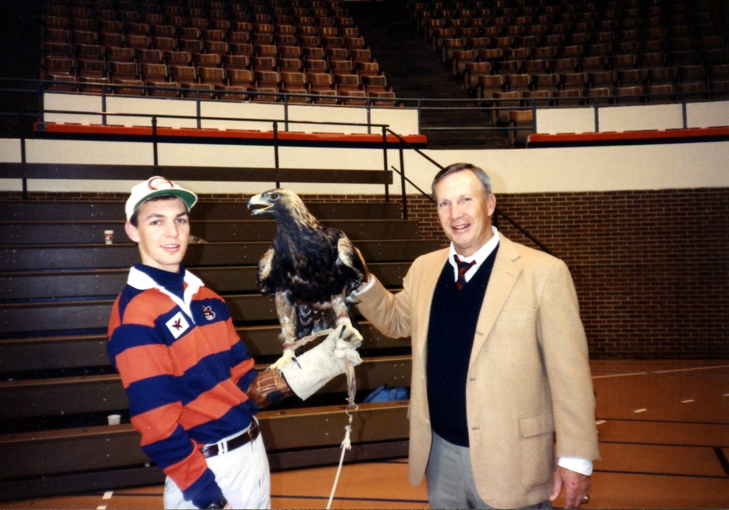Brother Erich with Coach Dye and War Eagle VI at a basketball game, 1991